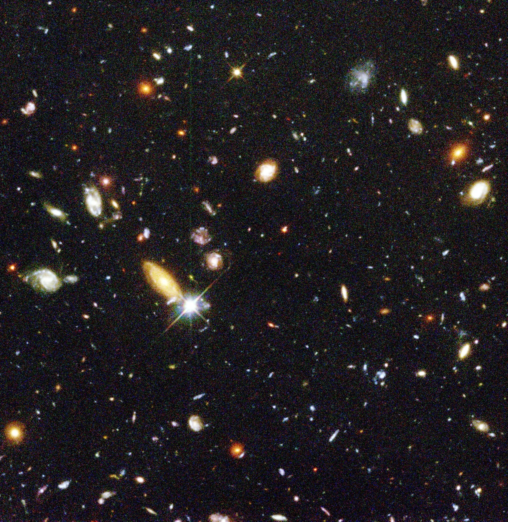 The image shows a central portion of the Hubble Deep Field, created from exposures taken in 1995. The Hubble Deep Field covers a piece of sky about 1/13th the diameter of the full Moon.