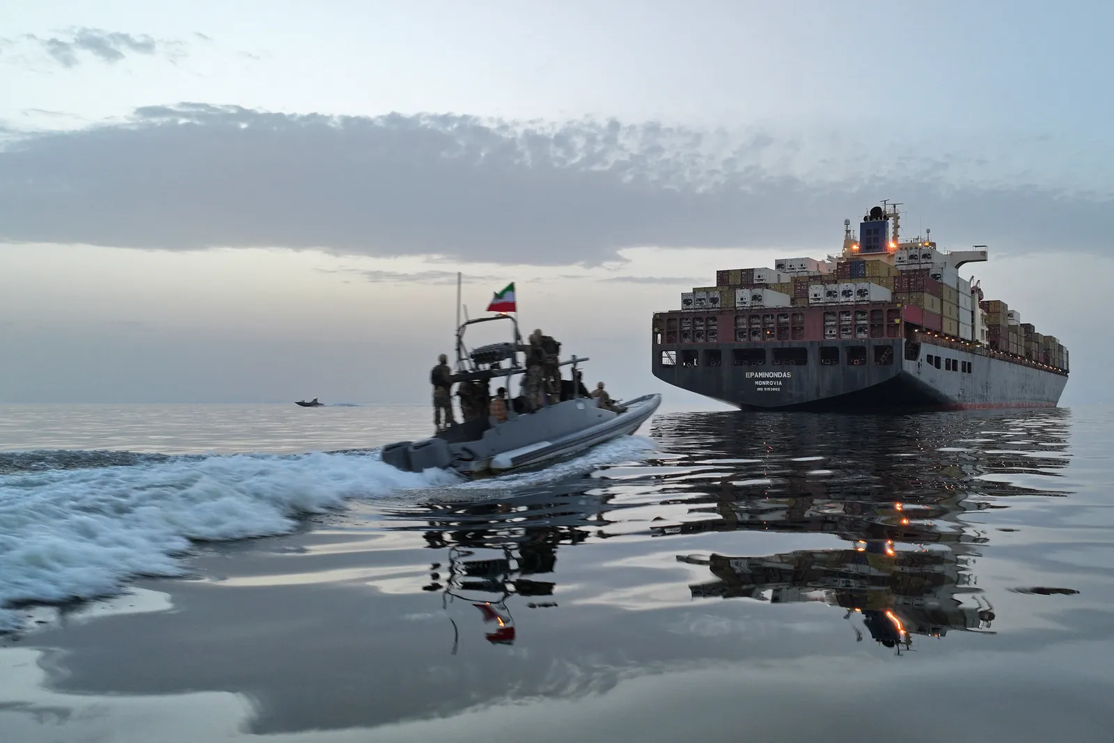 Image may contain Transportation Vehicle Watercraft Yacht Boat Person Cruiser Military Navy Ship and Canoe