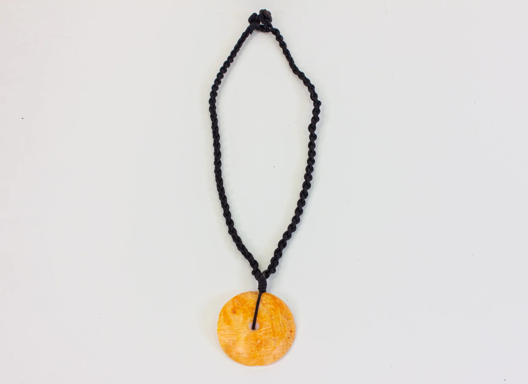 The “Gualofan” is a traditional Chamorro body ornament that was used in ancient society and has become a modern expression of Chamorro identity. 